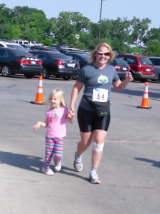 Running with my daughter in 2010 (I was heavier then)