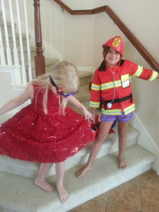 Rylee and her friend, Lexy, playing dress up