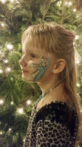 My daughter with Elsa face paint