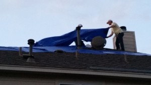 Tarp over the hole in our roof